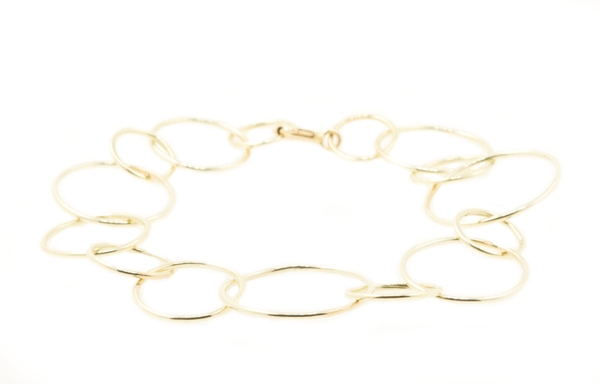 Handgemaakte en fairtrade gouden schakelarmband