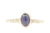 Handgemaakte en fairtrade zilveren gehamerde ring met een ovale cabochon geslepen tanzaniet